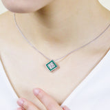 18K White Gold Emerald & Diamond Pendant